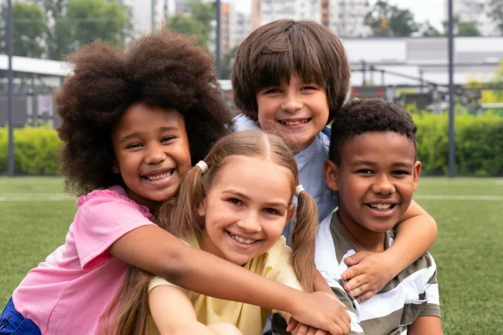 Smiling children together outdoors