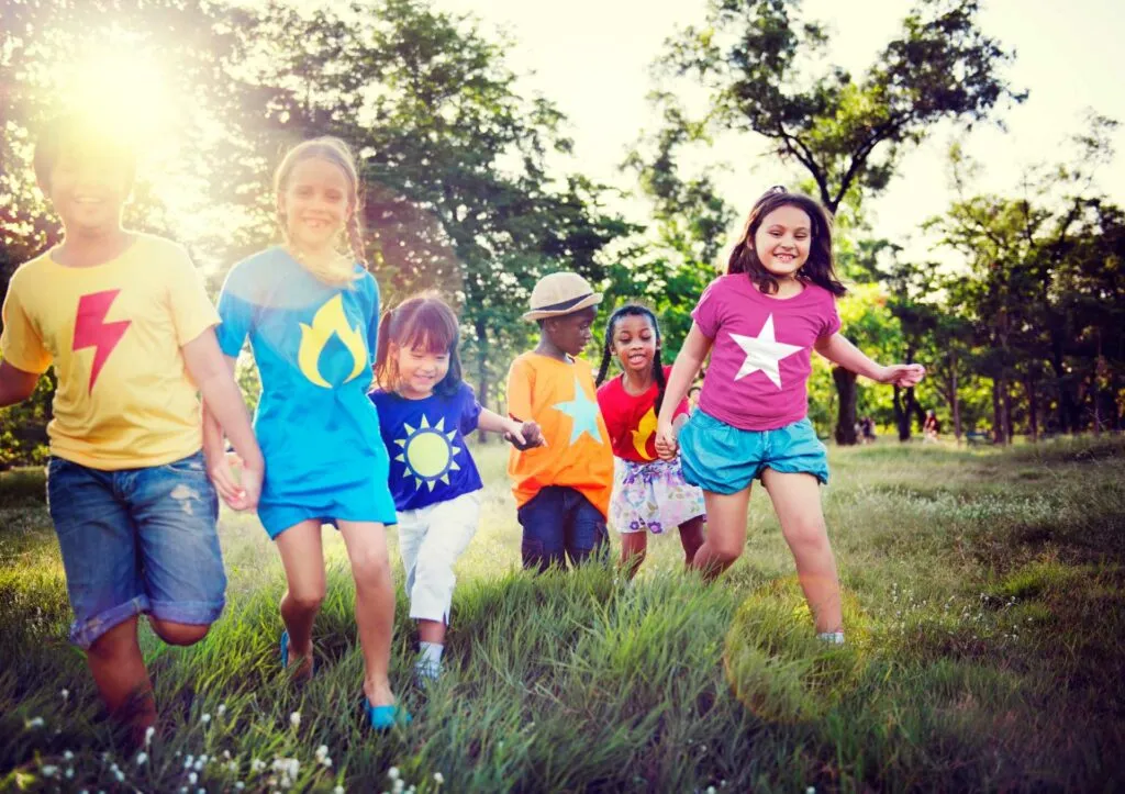 Happy children playing outside